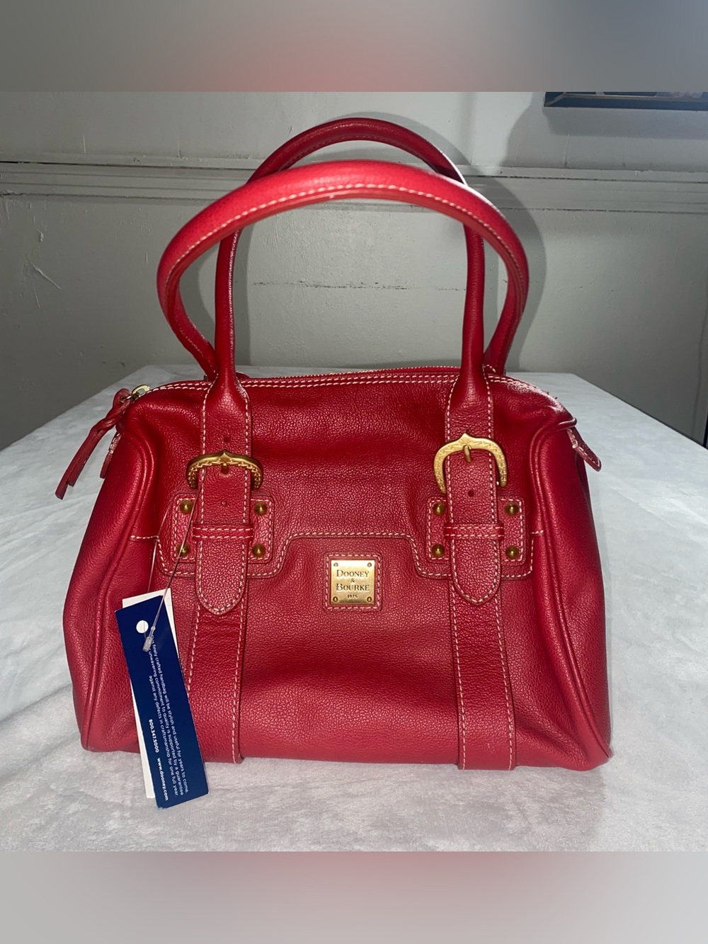 Dooney & Bourke Medium Double Buckle Red Satchel retails at $298